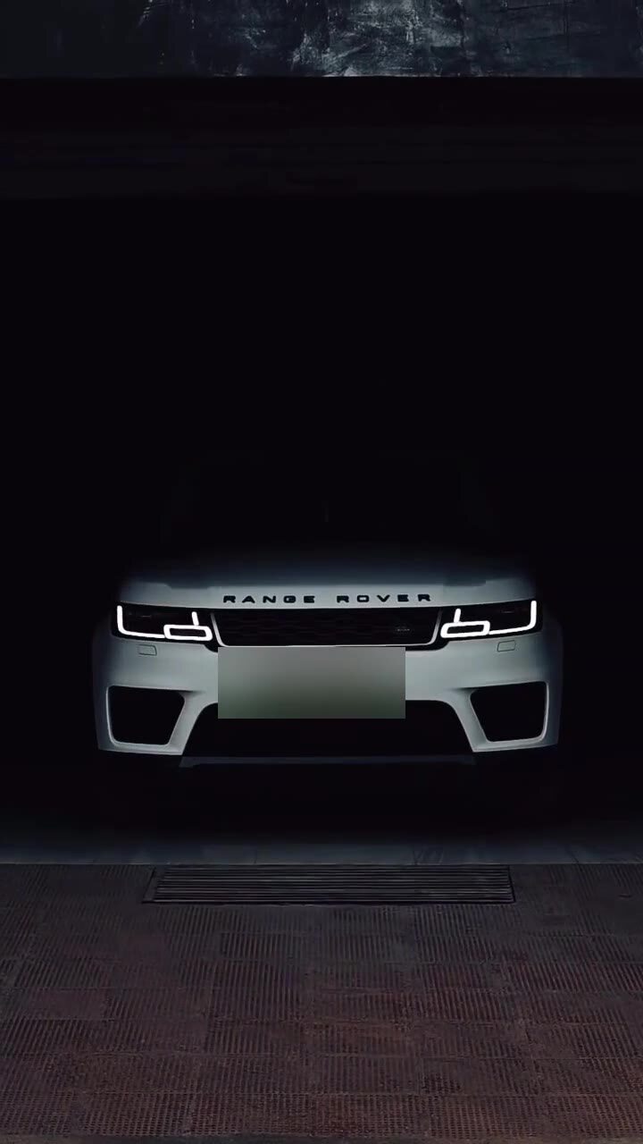 Range Rover in a controlled, low-light setting