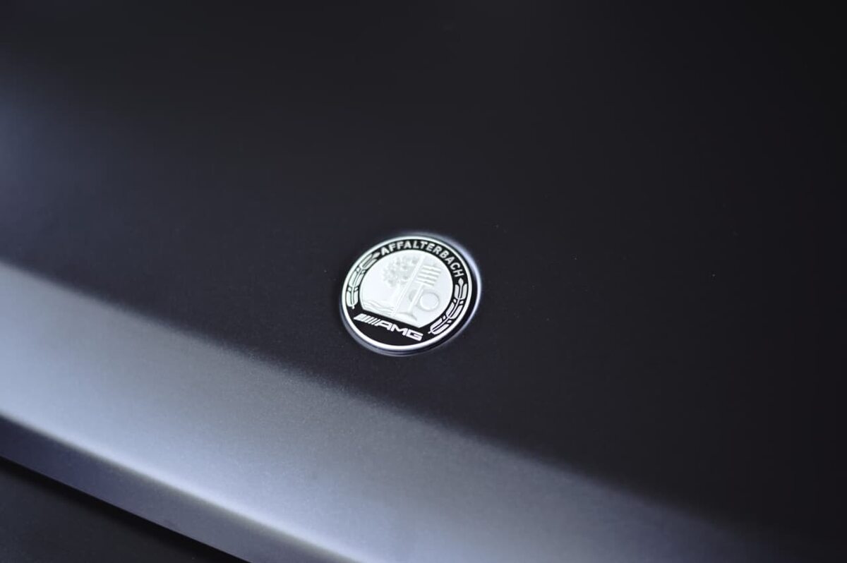 Affalterbach crest set into graphite bodywork